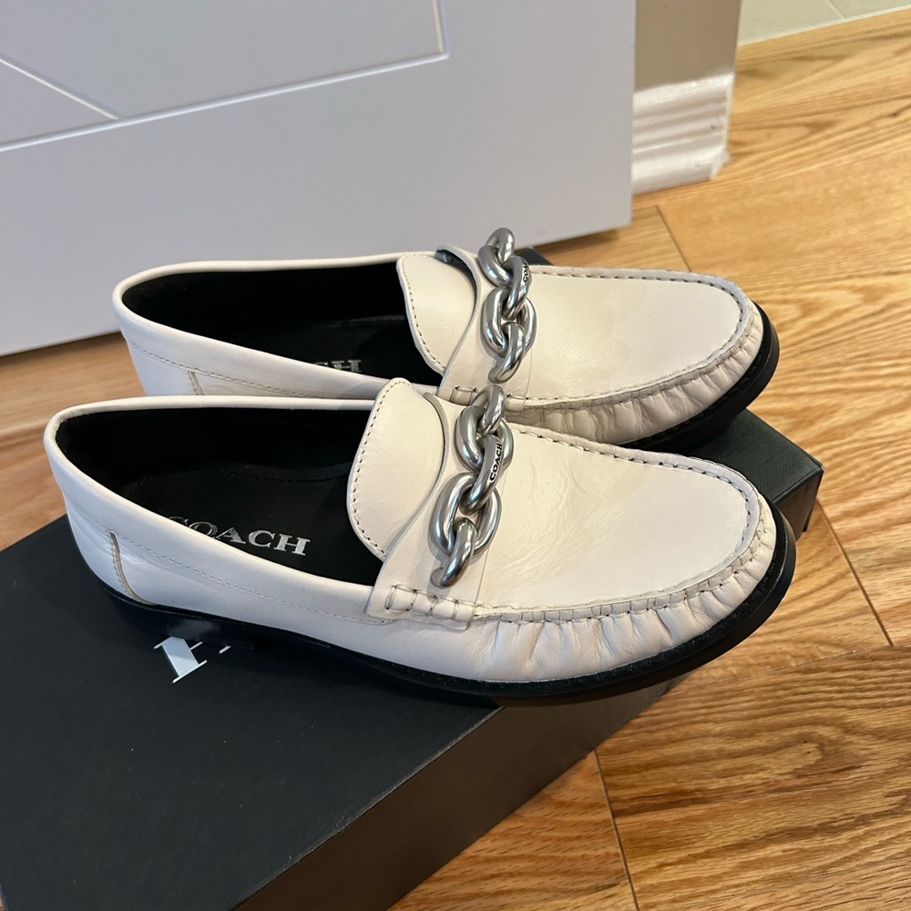 Brand new Coach leather shoes, with metal bucket